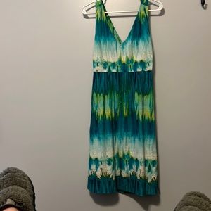 Tommy Bahama dress cute open back 15 inches wide in busy area 40 inches long.